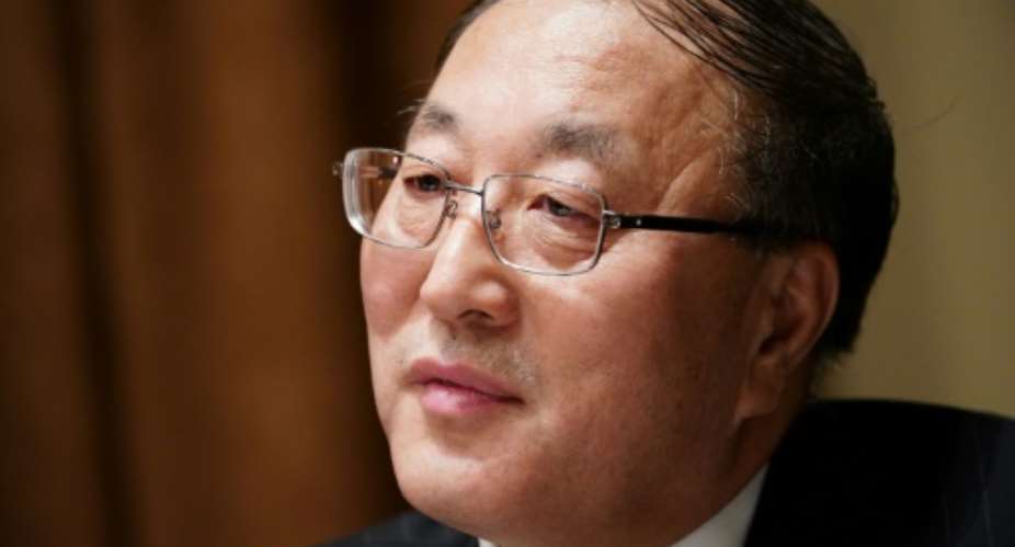 China's ambassador to the United Nations, Zhang Jun, seen here in December 2019, has sharply criticized the United States over its criticism on the coronavirus.  By MANDEL NGAN AFPFile