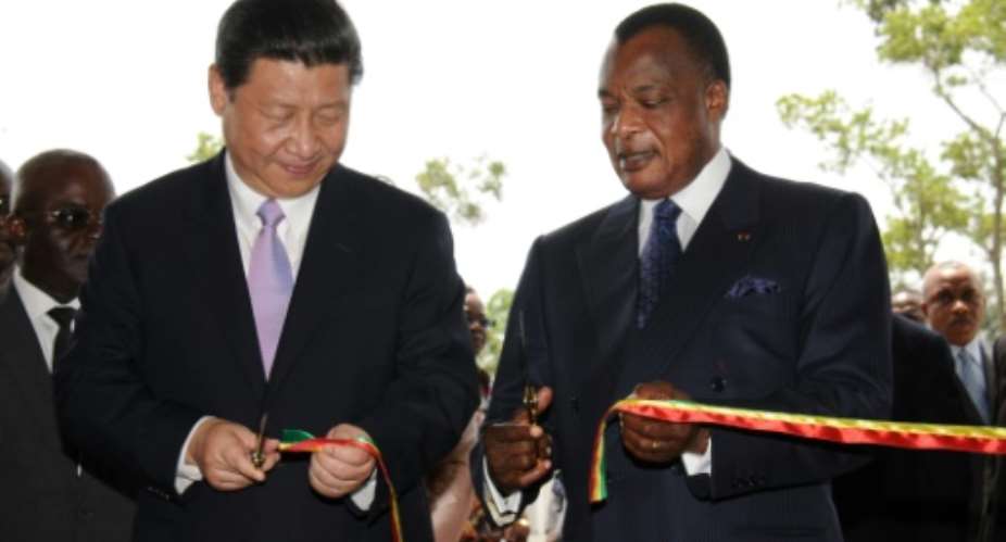 Chinese President Xi Jinping and his Republic of Congo counterpart Denis Sassou Nguesso, pictured in 2013. China has invested heavily in Congo-Brazzaville.  By Laudes Martial Mbon AFPFile