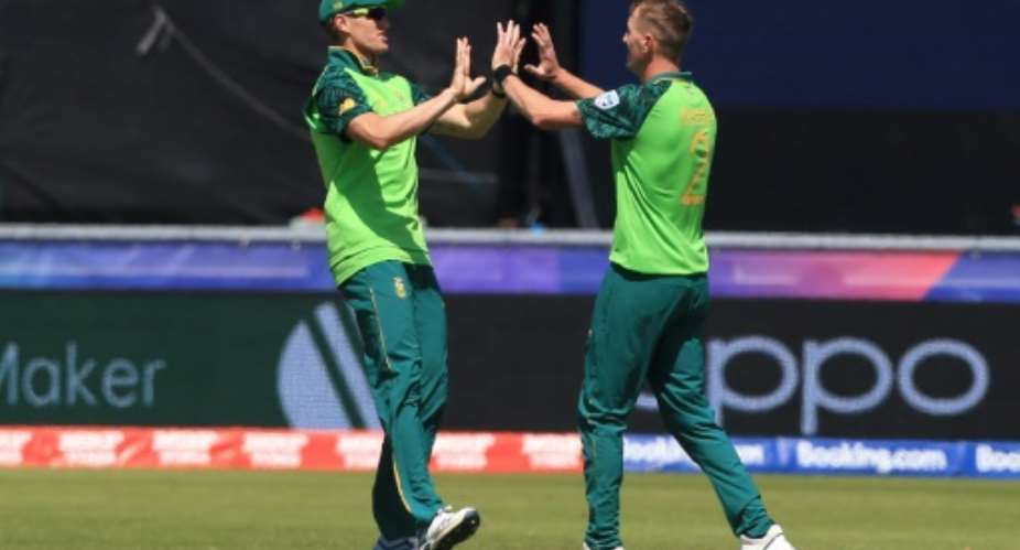 Chris Morris R with Faf du Plessis during the 2019 Cricket World Cup.  By Lindsey PARNABY AFPFile