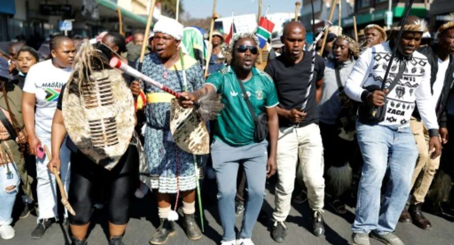 Citizen-led groups have issued an unofficial ultimatum for undocumented foreign nationals to leave South Africa.  By Marco Longari (AFP)