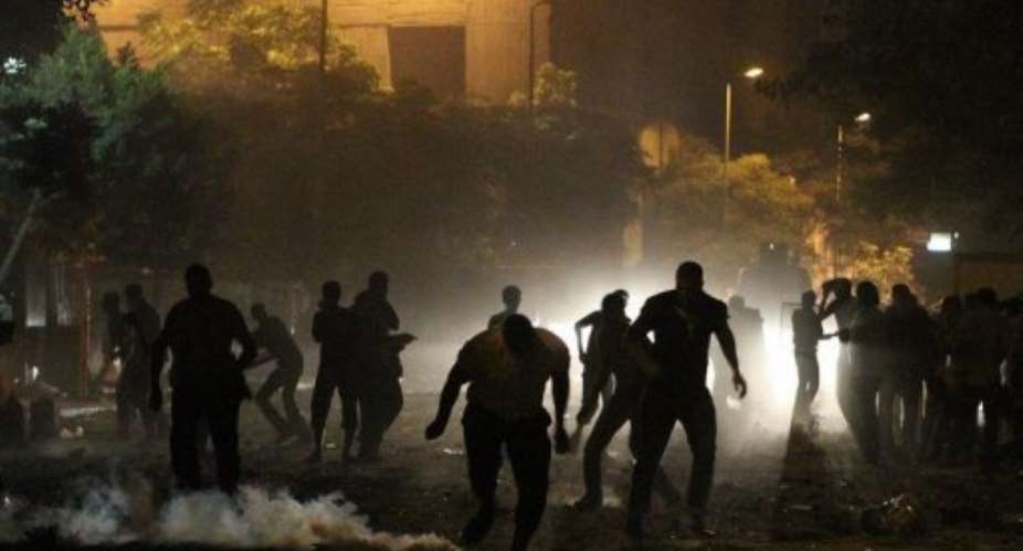 Tahrir Square was sealed off as police continued to fire tear gas into the early hours of Wednesday.  By Khaled Desouki (AFP)