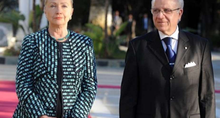 US Secretary of State Hillary Clinton, flanked by Algerian Prime Minsiter Mourad Medelci R.  By Farouk Batiche AFP