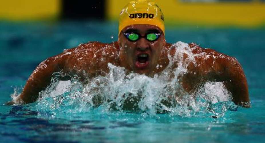 Chad Le Clos of South Africa swims to win the mens 200 metre butterfly race during the fourth stage of the FINA Swimming World Cup in Dubai on October 17, 2013.  By Marwan Naamani (AFP)