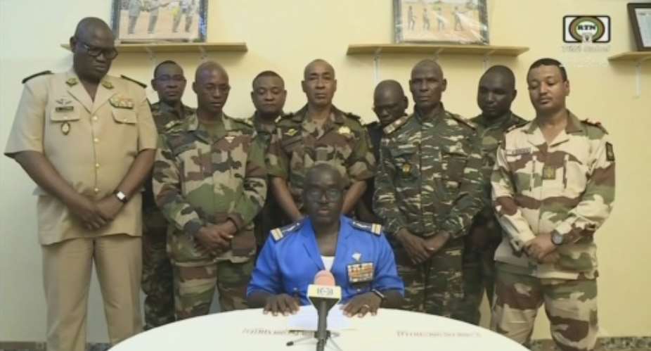 Colonel-Major Amadou Abdramane said: We, the defence and security forces... have decided to put an end to the regime of President Bazoum.  By - ORTN - Tl SahelAFP
