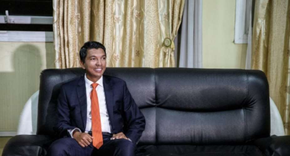 Comeback: Andry Rajoelina will return to the presidency after defeating long-term rival Marc Ravalomanana.  By GIANLUIGI GUERCIA AFP