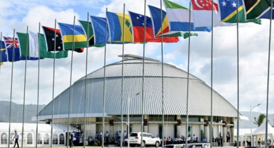 Commonwealth flags fly outside the parliament of Samoa during the Commonwealth Heads of Government Meeting in Apia.  By William WEST (AFP)