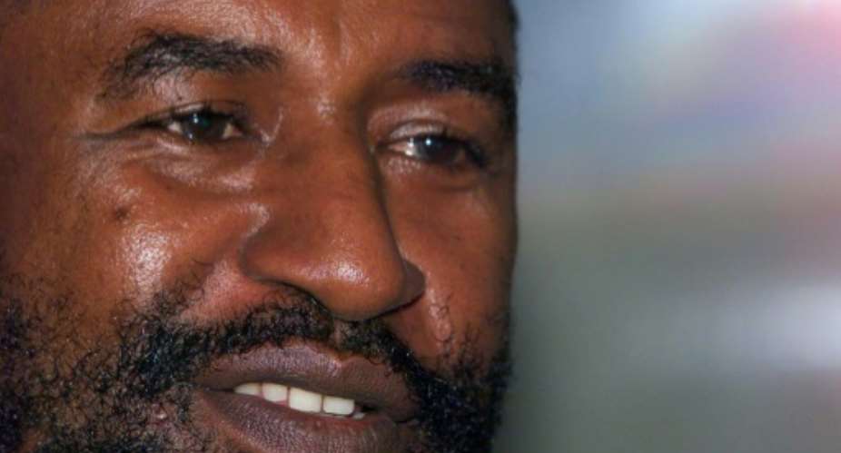 Comoros' President Azali Assoumani, seen here in 1999 when he first came to power following a military coup he led while serving as the army's chief of staff.  By ALEXANDER JOE AFPFile