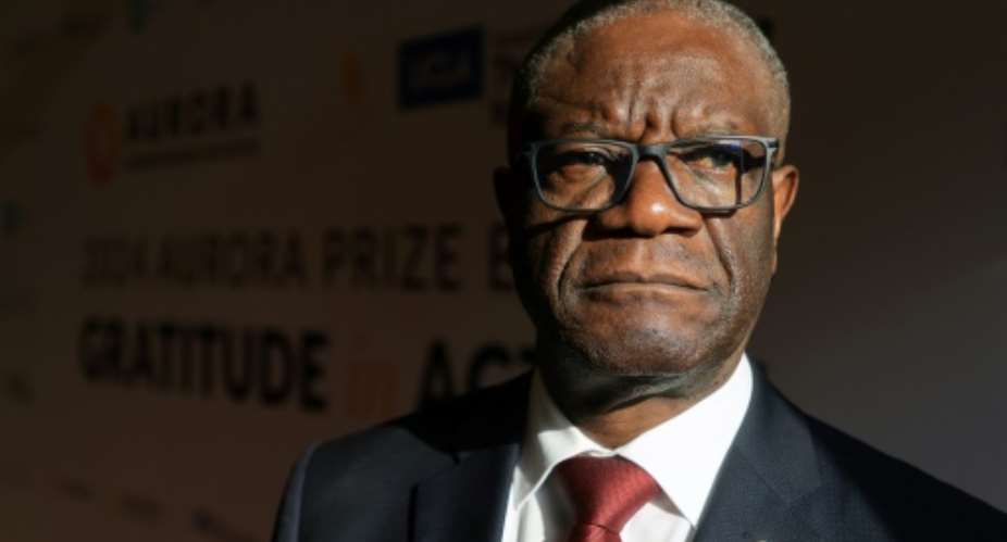 Congolese gynecologist Denis Mukwege poses for a portrait at the UCLA Luskin Conference Center in Los Angeles, California on May 9, 2024, where he was awarded the 2024 Aurora Prize for Awakening Humanity.  By David SWANSON (AFP)