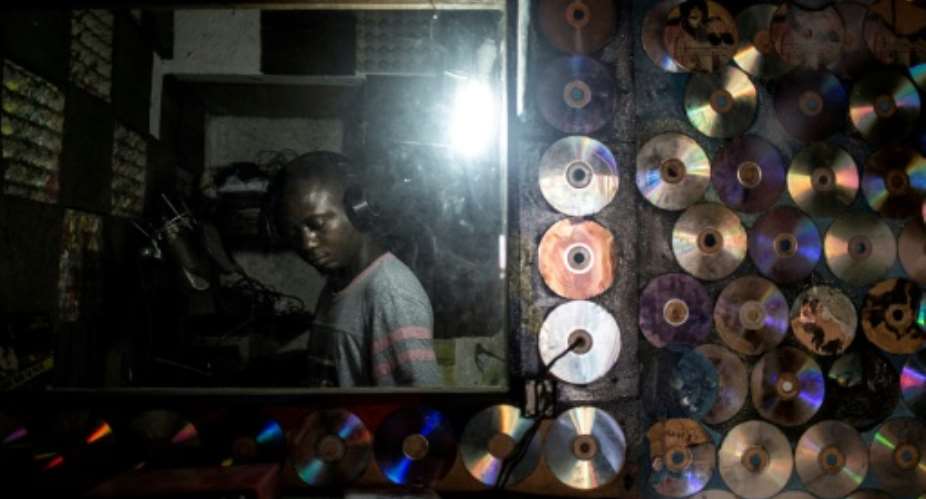 Congolese hiphop enthusiasts have flocked to Kinshasound, one of Kinshasas few local recording studios at the heart of a wave of new rap music.  By JOHN WESSELS (AFP)
