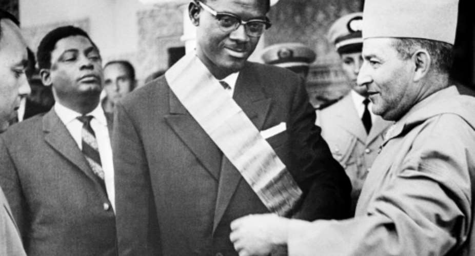 Congolese leader Patrice Lumumba, seen receiving a decoration from Moroccos King Mohammed V in August 1960.  By - (AFP/File)
