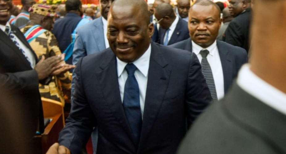Congolese President Joseph Kabila C refused to stand aside at the end of his term late 2016.  By JUNIOR D.KANNAH AFPFile