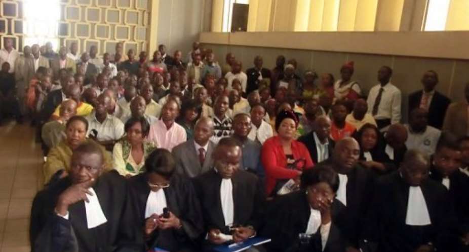 Lawyers wait in a Brazzaville court on August 6, 2013, for the opening of the Congolese soldiers trial.  By Laudes Martial Mbon (AFP/File)