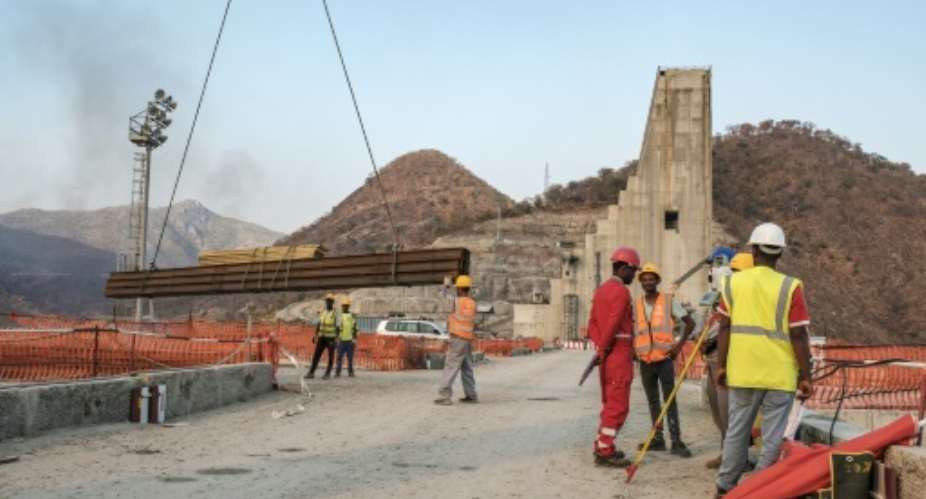 Construction is carried out at the Grand Ethiopian Renaissance Dam, near Guba in Ethiopia, in December 2019.  By EDUARDO SOTERAS AFPFile