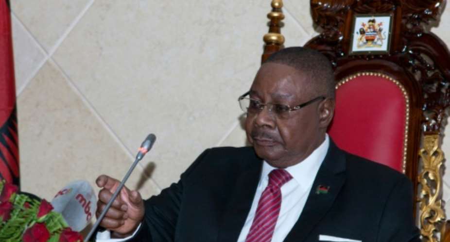 Contested election: President Peter Mutharika was declared victor by a margin of around three percentage points.  By AMOS GUMULIRA AFP
