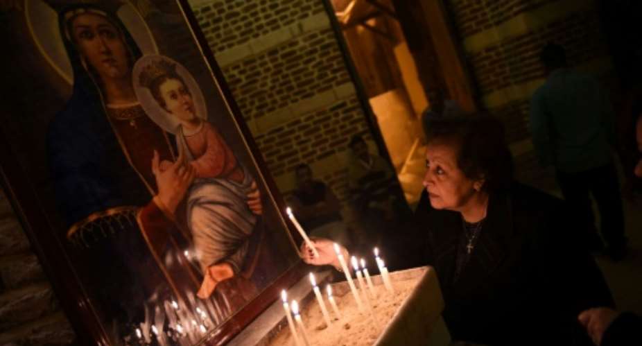 Coptic Christians make up around 12 percent of Egypt'spopulation of 100 million.  By MOHAMED EL-SHAHED AFPFile