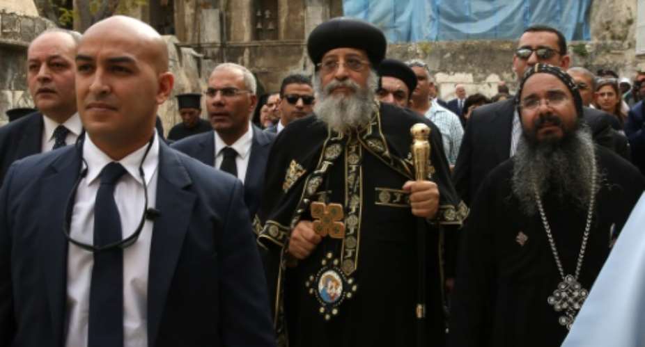 Egyptian Coptic Pope Tawadros II (C) arrives to the funeral of Archbishop Anba Abraham, the head of the Coptic Church in the Holy Land, on November 28, 2015 at the Coptic Patriarchate of Jerusalem.  By Gali Tibbon (AFP)