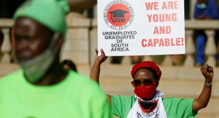 Coronavirus restrictions have battered South Africa's economy - nearly a third of the workforce is jobless.  By Phill Magakoe AFP