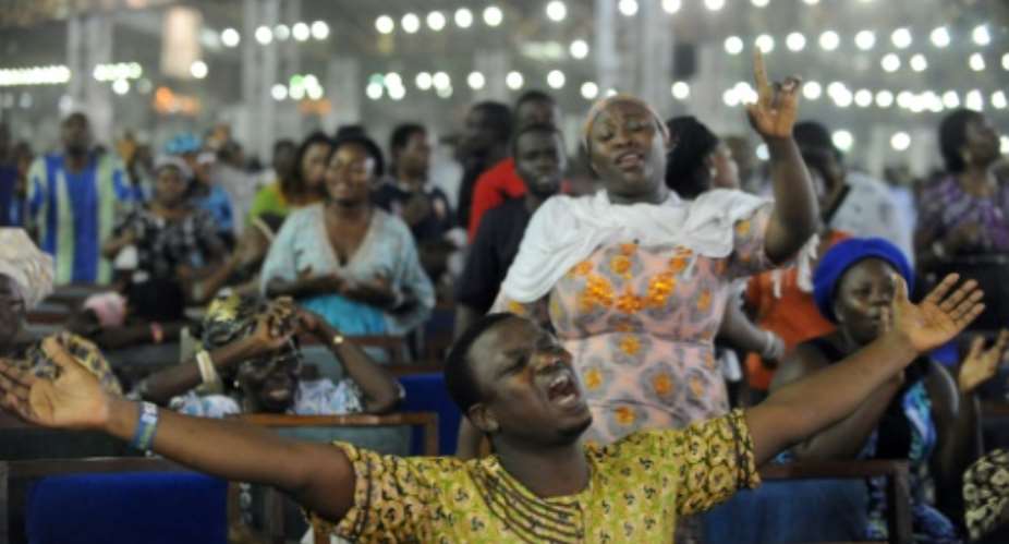 'Crossover' is an eagerly-awaited moment for many Nigerian Christians. Congregations pray throughout the night on New Year's Eve that the coming year will be good.  By PIUS UTOMI EKPEI AFP