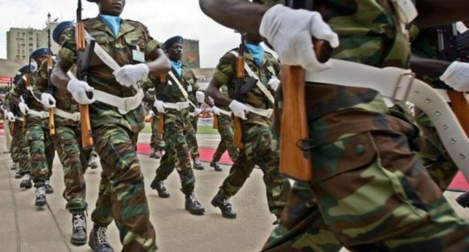 Angolan soldiers parade in Luanda.  By Alexander Joe (AFP/File)