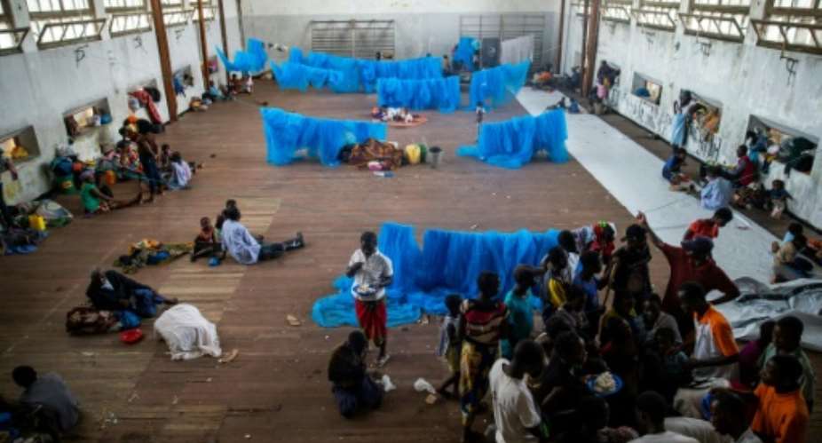 Cyclone survivors shelter in a school in Beira, Mozambique.  By WIKUS DE WET AFP
