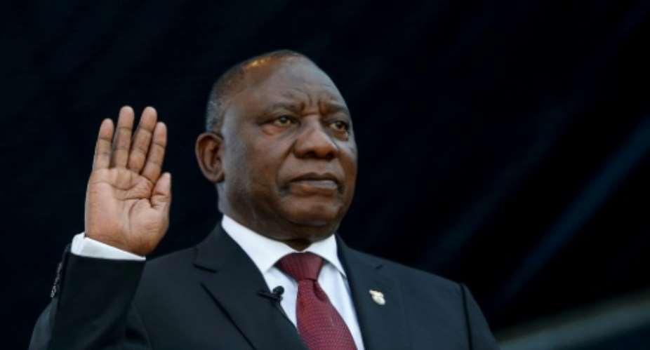 Cyril Ramaphosa was sworn in for a five-year term as president of South Africa.  By SIPHIWE SIBEKO POOLAFP
