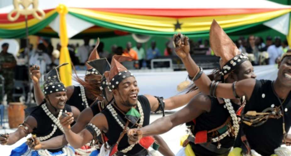 Dancers perform during a ceremony marking Ghana's first oil production in Takoradi on December 15, 2010.  By PIUS UTOMI EKPEI AFPFile
