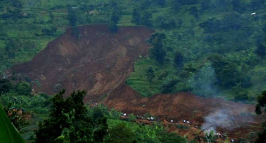 Dangerous soil: File picture from 2012 of a landslide in Bududa in which at least 18 people died.  By ISAAC KASAMANI AFP