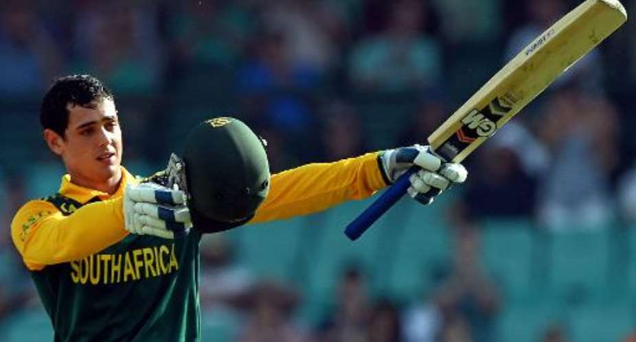 South Africa's Quinton de Kock celebrates his 100 runs against Australia during their fifth ODI in Sydney on November 23, 2014.  By Saeed Khan AFP