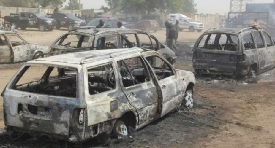 Deadly: At least 30 people were killed and women and children were abducted, in an ISWAP attack on the village of Auno in northeast Nigeria in February last year.  By AUDU MARTE AFP