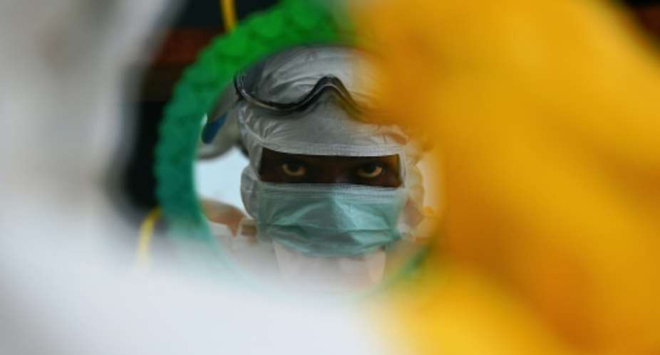 The WHO said that the Ebola outbreak in West Africa no longer constituted an international emergency, but the announcement of new cases in Guinea demonstrates the difficulty of managing the aftermath of the virus.  By Carl de Souza AFPFile