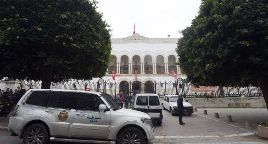 Tunisian police stand guard in front of the court in Tunis.  By  AFPFile