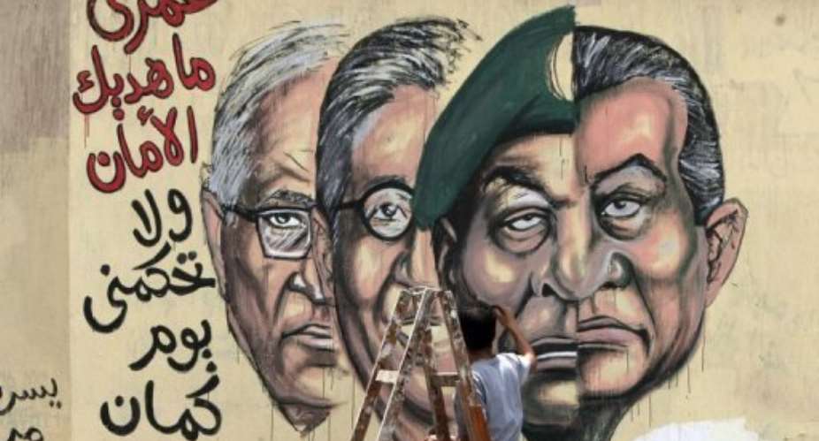 Egypts military will continue its historic responsibility after the end of the state of emergency.  By Mahmud Hams (AFP/File)