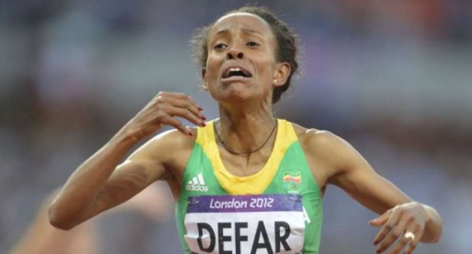 Ethiopia's Meseret Defar reacts after winning the women's 5000m.  By Eric Feferberg AFP