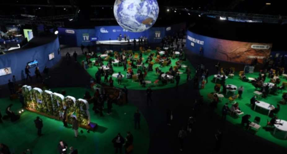 Delegates are charged with keeping the Paris Agreement temperature goals alive even as climate-driven disasters hit countries the world over.  By Paul ELLIS (AFP)