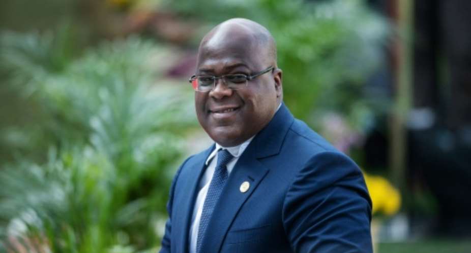 Democratic Republic of Congo, whose president Felix Tshisekedi is pictured here, shares borders with four of the six members of the East African Community, which he seeks to join.  By Michele Spatari AFPFile