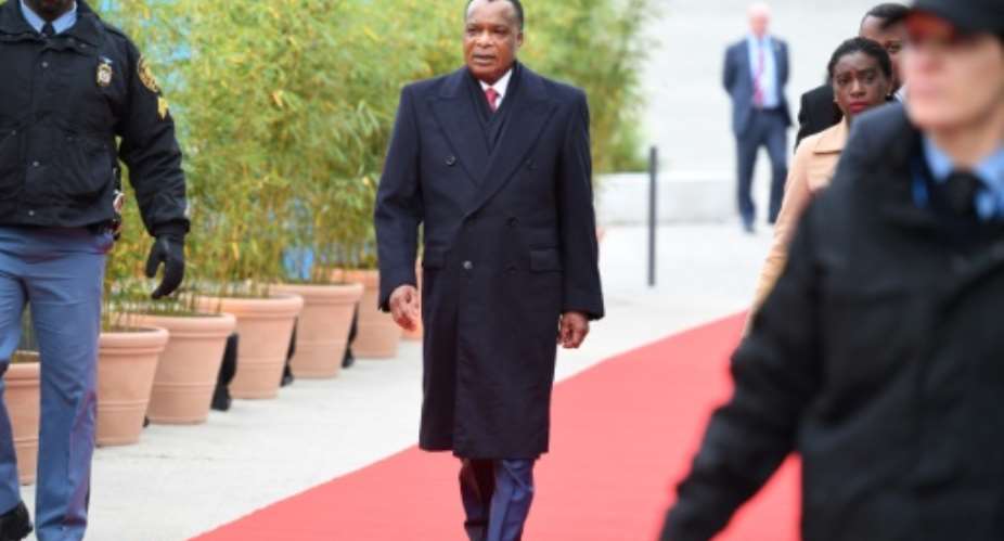 Denis Sassou Nguesso (C), President of the Republic of the Congo, is the frontrunner in the election.  By Patrik STOLLARZ (AFP)