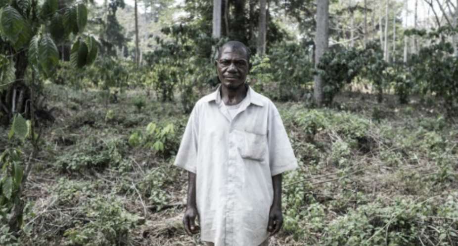 Devastated home: Eugene Omokami, a member of the Aka pygmy community.  By Barbara DEBOUT (AFP)