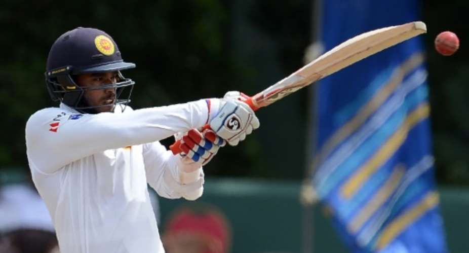 Dhananjaya de Silva scored 127 in Sri Lanka's first innings in the second Test against Zimbabwe in Harare on November 7, 2016.  By Lakruwan Wanniarachchi AFPFile