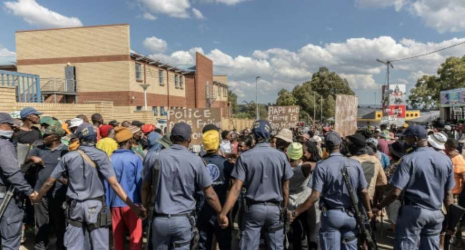 Diepsloot residents regularly hold protests against the high murder and rape rates in the township.  By GUILLEM SARTORIO AFPFile