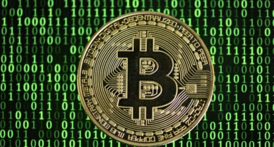 Digital currencies are popular in Nigeria, where they are seen as ways of easing business in a country known for corruption, currency fluctuations and often sidelined in the past by the global financial system.  By INA FASSBENDER (AFP/File)