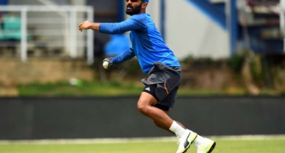 Dinesh Karthik was flown in as a replacement for injured wicketkeeper Wriddhiman Saha and could play as India seek to avoid a series whitewash when they play South Africa in the third and final Test.  By Jewel SAMAD AFPFile