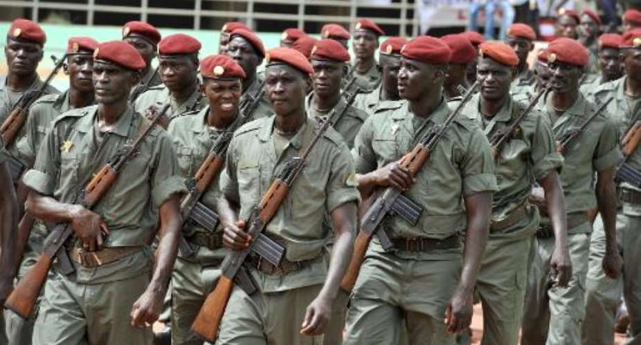 Army forces march during the inauguration of Malis new president on September 19, 2013 in Bamako.  By Issouf Sanogo (AFP/File)