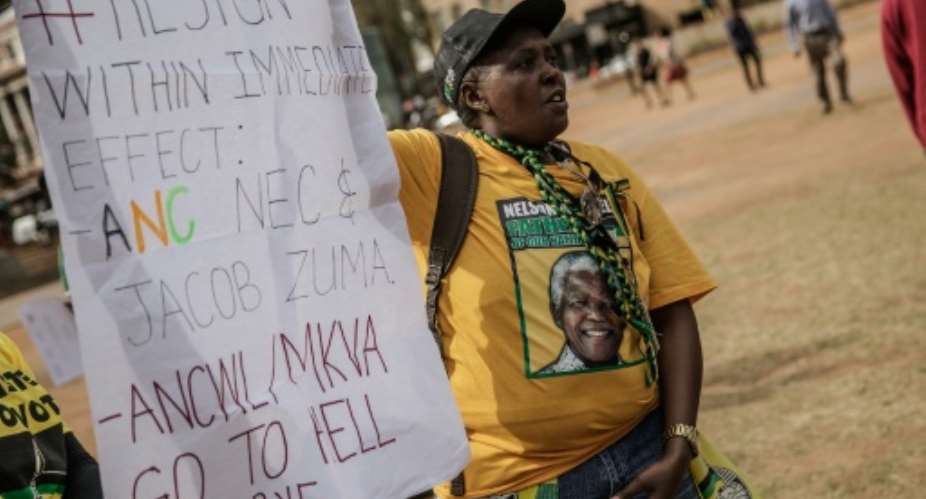 Disgruntled members of South Africa's ruling African National Congress ANC party demonstrate demanding the resignation of President Jacob Zuma.  By Gianluigi Guercia AFPFile
