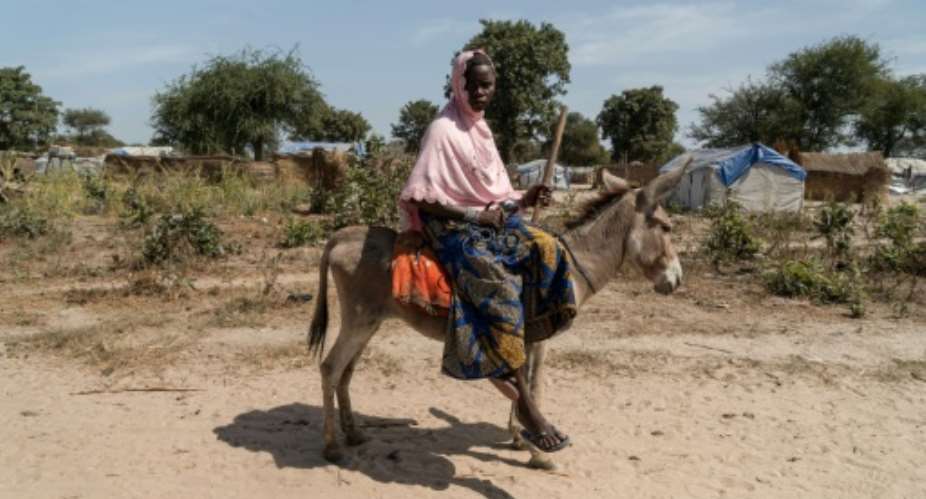 Displaced by decades of conflict, young people like Amani Abdramane see the elections as a chance for a better future.  By Mariam KONE (AFP)