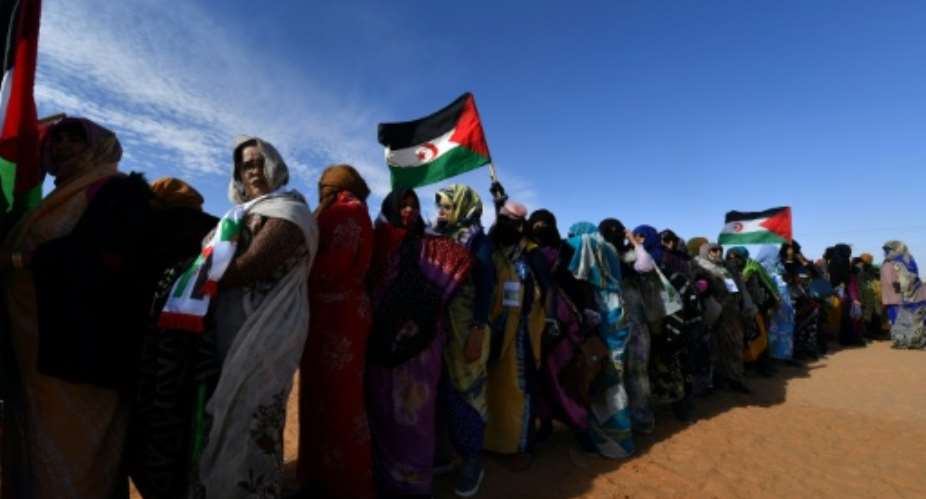 Displaced Sahrawis arrive at a Polisario congress at the refugee camp of Dakhla on January 13, 2023.  By Ryad KRAMDI (AFP)