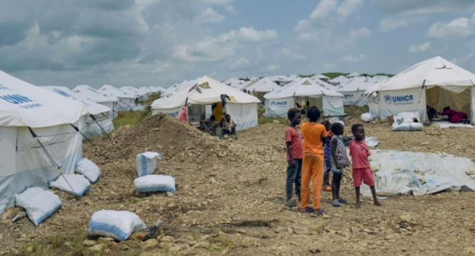 Displaced UNHCR says millions of refugees risk losing vital assistance due to budget cuts.  By - (AFP)