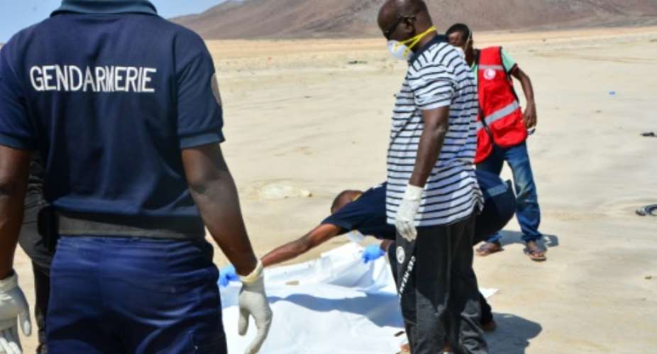 Djibouti has become a hub for migrants seeking to cross to Yemen and then seek work in the rich Gulf economies. Above: Police recover a body after two boats carrying migrants capsized in January 2019.  By Migane Megag AFPFile