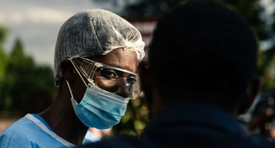 Doctors and nurses in Zimbabwe staged a walk-out in protest over a lack of protective clothing.  By Jekesai NJIKIZANA AFP