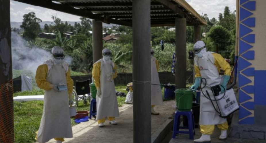 Doctors Without Borders (MSF) personnel prepare for Ebola treatment in the eastern Democratic Republic of the Congo.  By GLODY MURHABAZI (AFP)