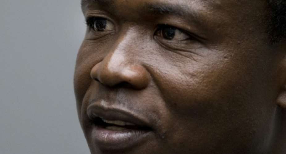 Dominic Ongwen, a former commander in the Lord's Resistance Army LRA, pictured at the International Criminal Court in The Hague, on December 6, 2016.  By Peter Dejong ANPAFPFile
